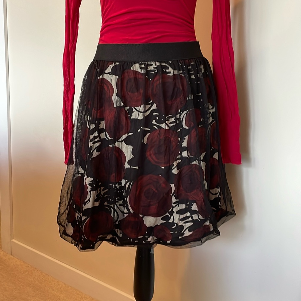Pull on rose skirt with netting overlay